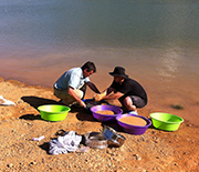 Scientists screenwashing Eocene sediment to recover microvertebrate fossils.