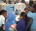 Photo of students using Scratch, an MIT-created programming language for children.
