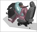 illustration of a simulated car crash with a human body model in the driver's seat