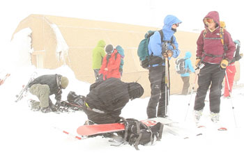 Researchers in a snow blizzard