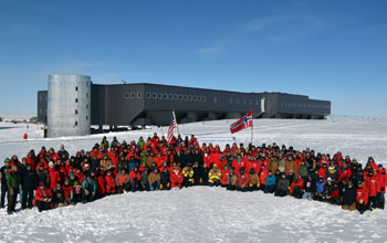 Photo of U.S. Antarctic Program personnel at the geographic South Pole on Dec. 14, 2011.