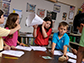 Students test for sound during a science experiment