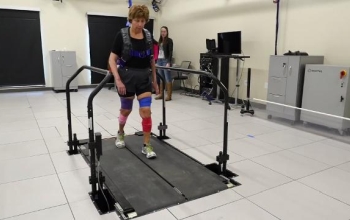 patient walking on a treadmill
