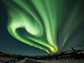 The aurora borealis’ swirling curtains of green light, captured in Alaska.