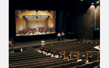 Researchers view test screening of prerecorded symphony performance created using new technology