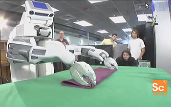 Robot folding a towel