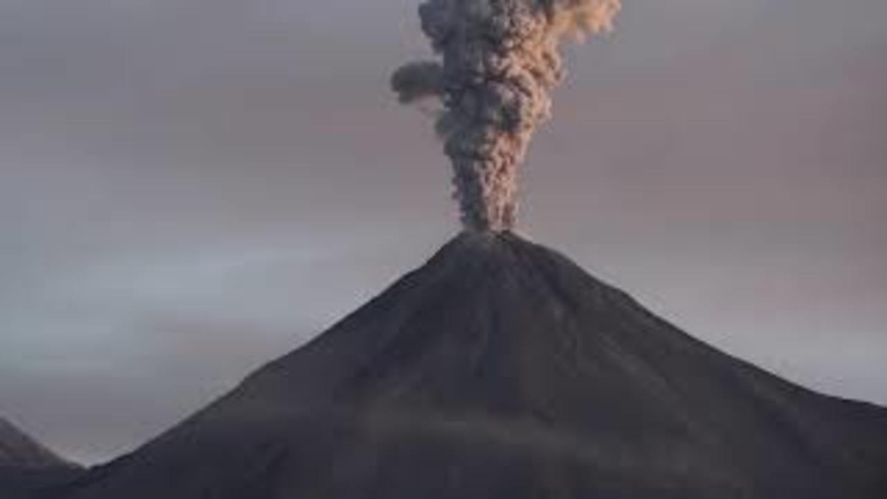 plume of smoke rising from volcano