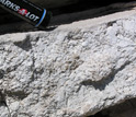 Photo of gypsum crystals embedded in calcite in a volcanic ash bed in Scotts Bluff.