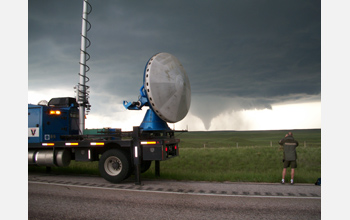 Photo of VORTEX2 researchers trailing this Wyoming twister during last spring's expedition.