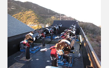 Photo of the MEarth telescopes at Mt. Hopkins, Arizona.