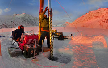 image of research team drilling ice cores