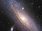 Andromeda Galaxy with two of its dwarf satellite galaxies