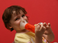 a child uses an inhaler