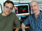 Thumbnail of 2 researchers and a computer monitor