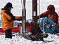 News thumbnail of two people drilling ice cores