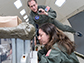 Andrew Feinberg and Lindsay Rizzardi test procedures for purifying blood samples on NASA’s microgravity plane
