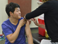 a student gets a flu shot