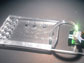 hybrid device integrates a microfluidic chip