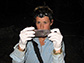 Kate Langwig examines a little brown bat
