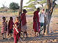 Mark Caudell discusses livestock movements with William Imani and Maasai herder boys