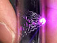 News thumbnail of close up of fingers holding flexible, stretchable printed circuit