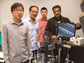 researchers with equipment