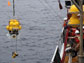 an ocean bottom seismometer being retrieved