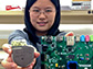 Sixing Lu holds a prototype network-connected pacemaker (left)