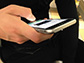 a person with a smartphone in their hand