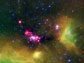 infant stars glowing reddish-pink