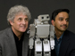 researchers with the humanoid robot