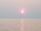 sun over ocean