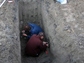 researchers digging a trench