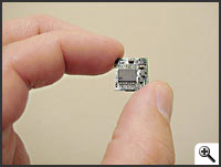 Hand holding a wireless sensor -- Click to enlarge