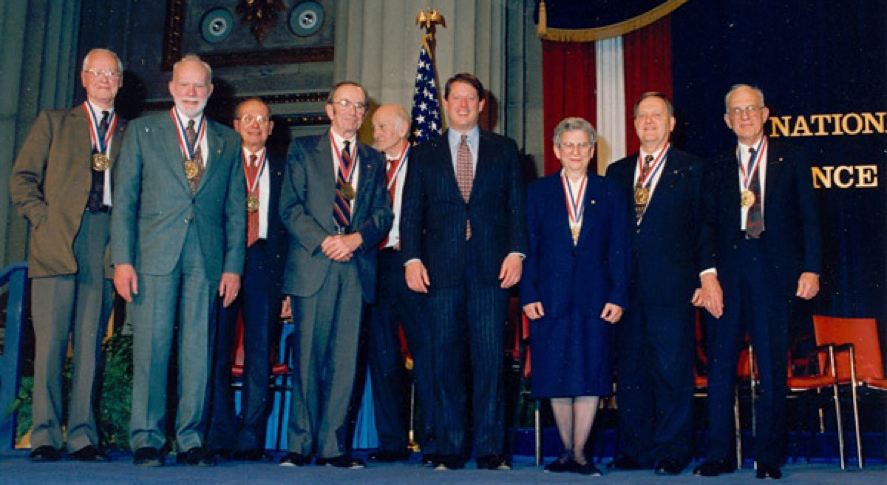Vice President Al Gore with 1994 National Medal of Science awardees Robert Merton, George S. Hammond, Frank Press, 
                  Thomas Elsner, John Cocke, Elizabeth Neufeld, Albert Overhauser and Ray Clough