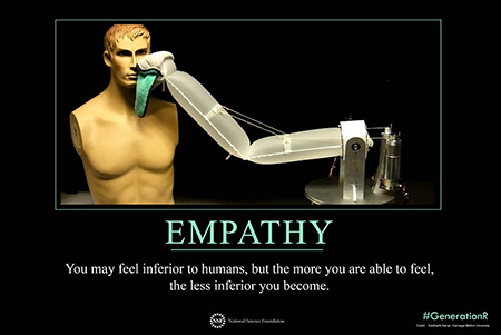 Robot arm with human dummy and the words: Empathy- You may feel inferior to humans, but the more you are able to feel,the less inferior you become.