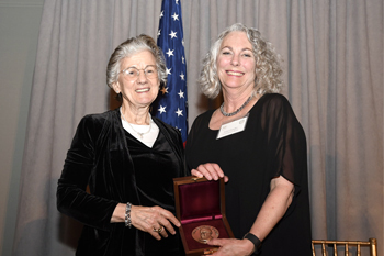 Image of Colwell and Chandler with Award Metal