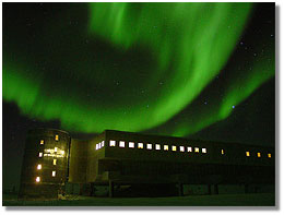 the Southern lights, over NSF's station at the South Pole; caption is below