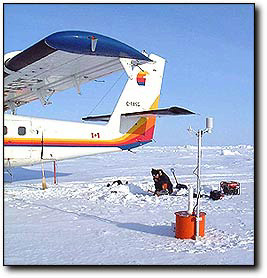 Photo of planes and bouys on ice; caption is below