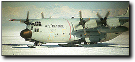 A ski-equipped LC-130 lands in Antarctica; caption is below.